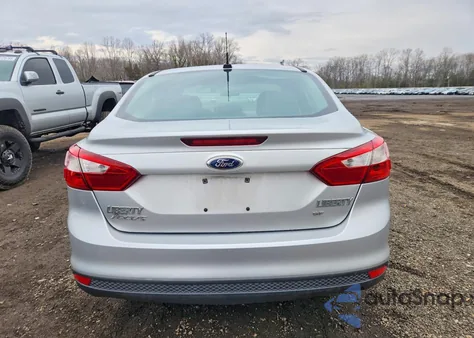 2014 Ford Focus Se z USA, uszkodzony, nr VIN 1FADP3F25EL104695